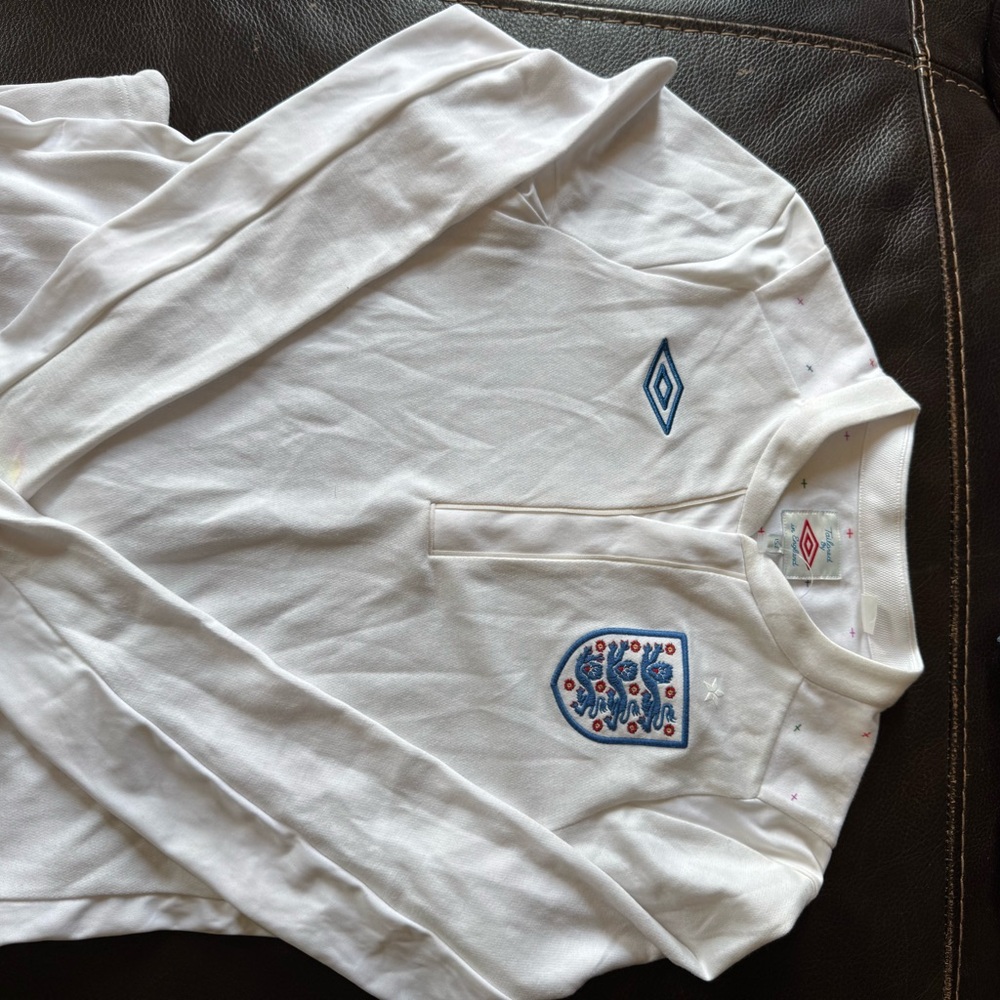 Umbro White Long Sleeve Shirt with Blue Emblem